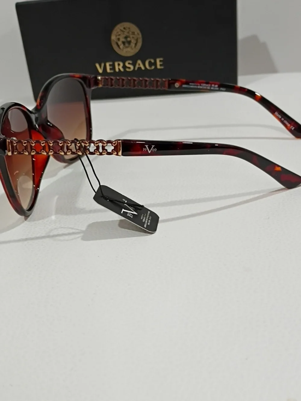 Versace Women's Black and Tortoiseshell Sunglasses with Dark Lenses